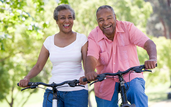 Older couple on bicycles